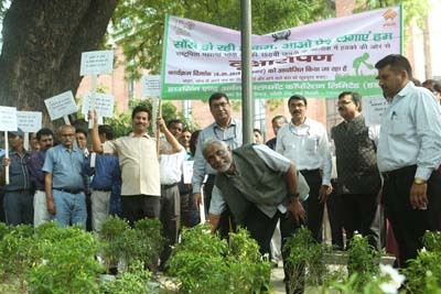 HUDCO CMD Dr M Ravi Kanth plants sapling to launch tree plantation drive