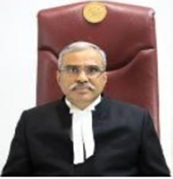 Justice Dinesh Kumar Sharma transferred to Calcutta HC